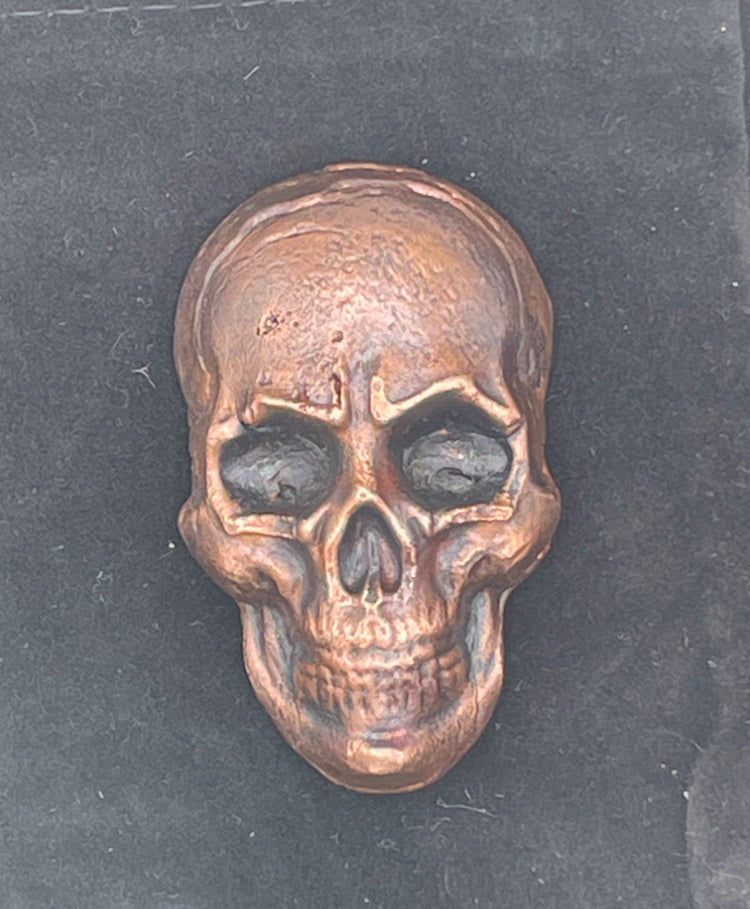 Hand poured copper skull