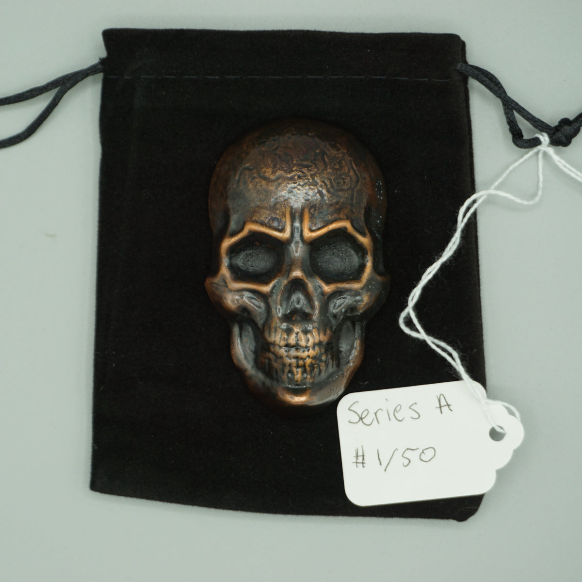 Hand poured copper skull series A cast 1/50