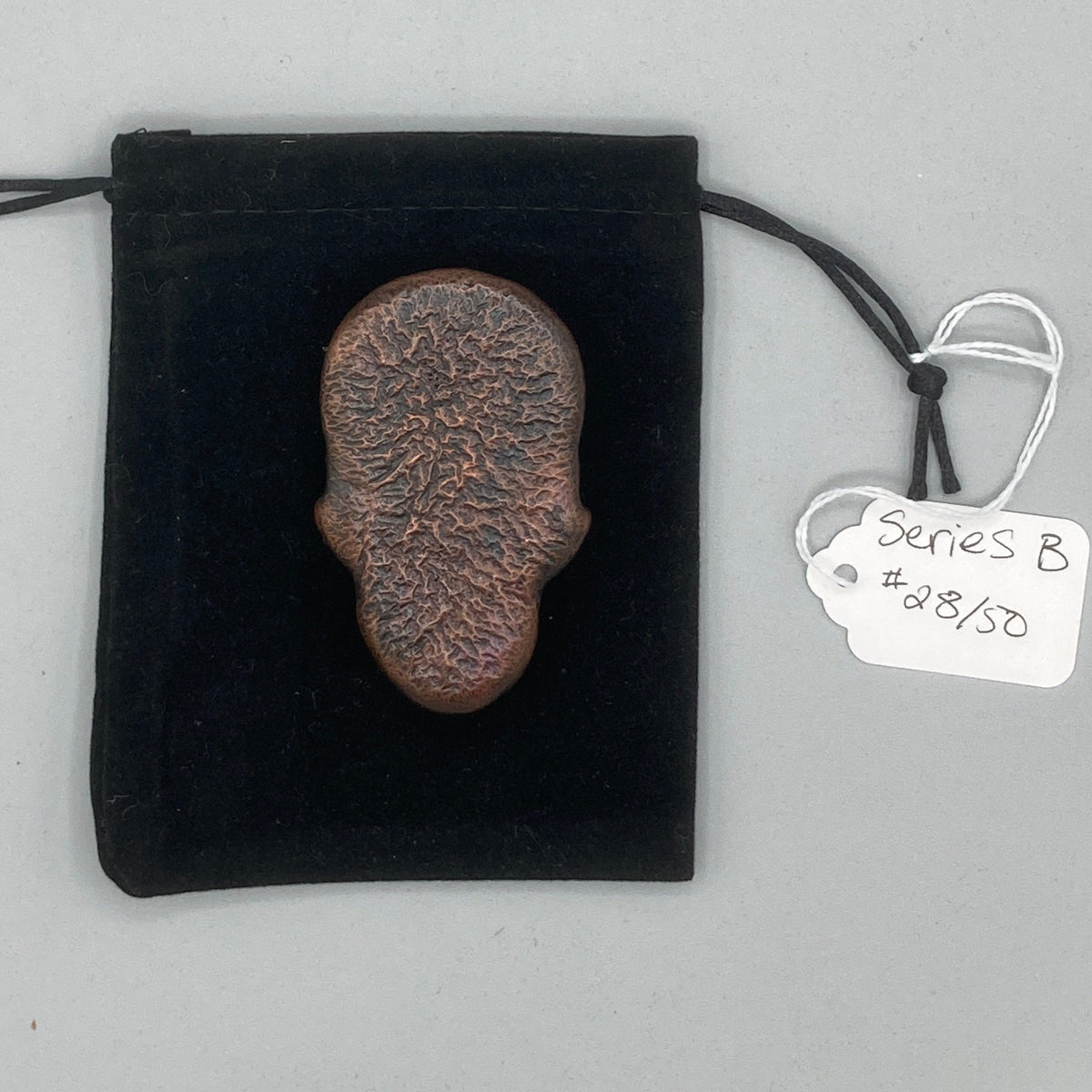 Hand poured copper skull series B cast 28