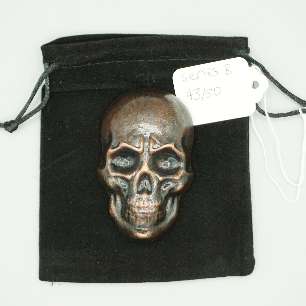Hand poured copper skull series B cast 43