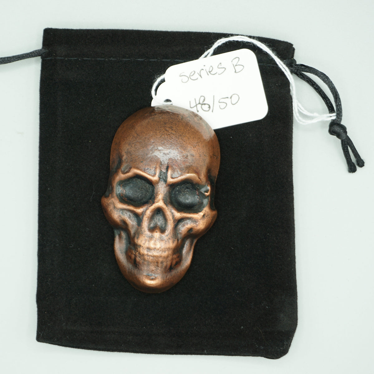 Hand poured copper skull series B cast 48