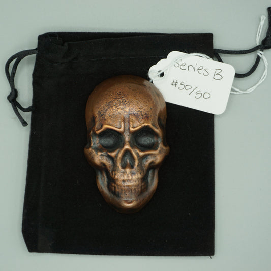 Hand poured copper skull series B cast 50